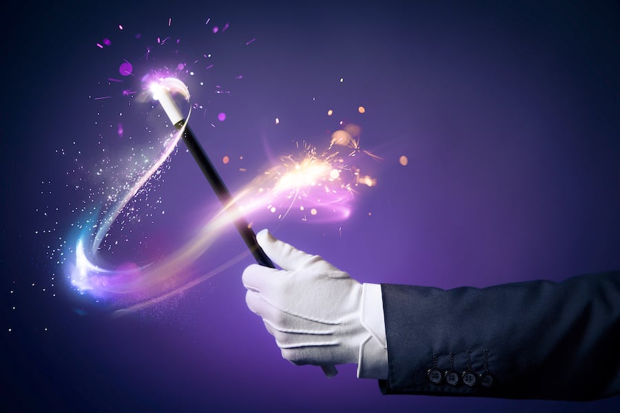 magician with white glove waving wand against purple background as metaphor for disappearing VA benefit of the doubt rule